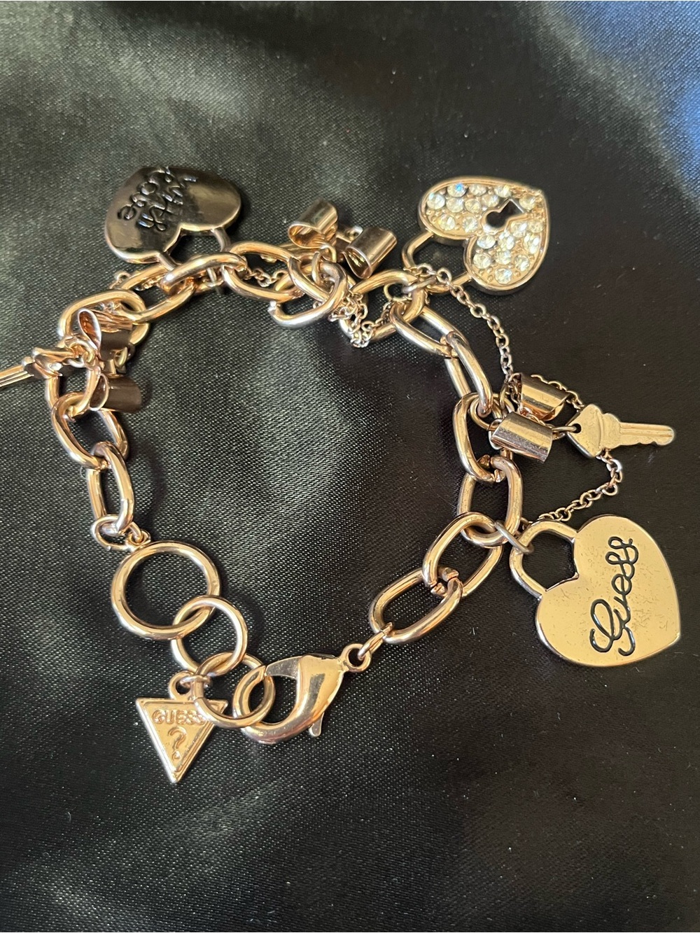 Guess Gold Tone Heart & Key Charm Bracelet
